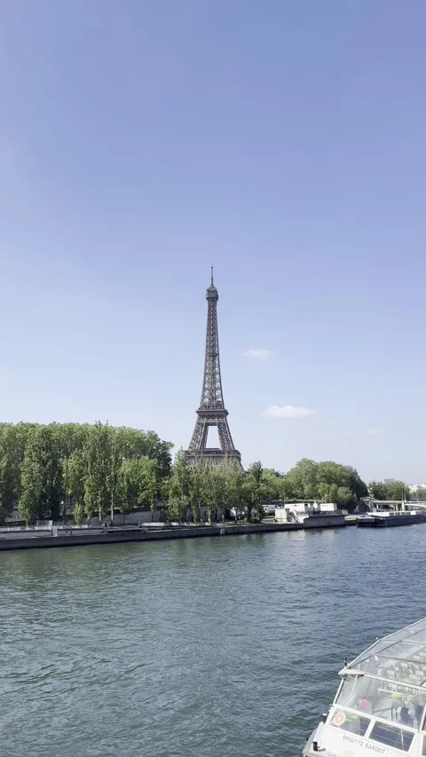 Eiffel Tower and Seine River in Paris, France on a clear spring day Stock Footage 337196667