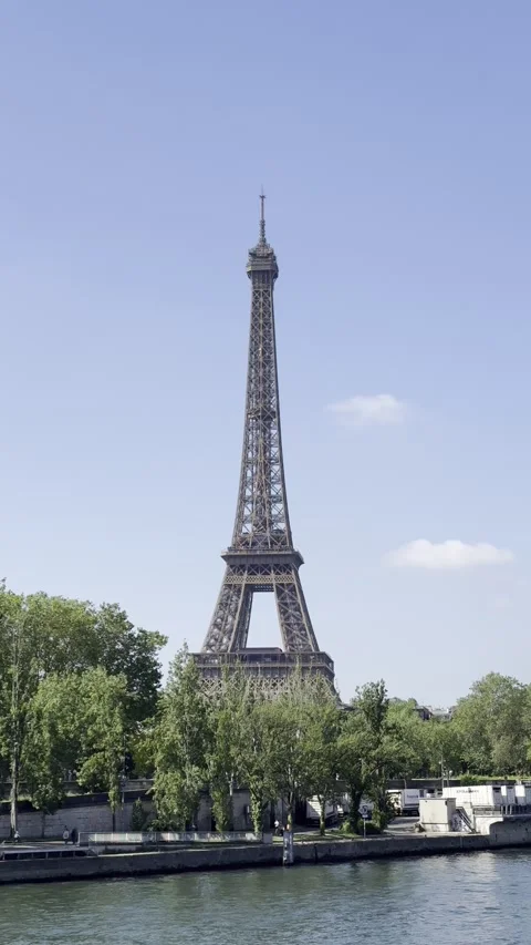 Eiffel Tower and Seine River in Paris, France on a clear spring day Stock Footage 337196668
