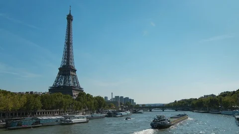 Eiffel Tower with a barge on the Seine Stock Footage 91362261