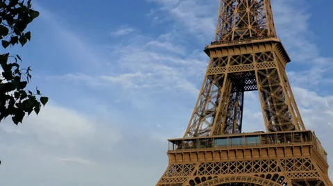 Eiffel Tower on blue cloudy sky. Paris, France Stock Footage 37559199