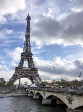 Eiffel Tower at blue cloudy sky, Paris, France Foto stock