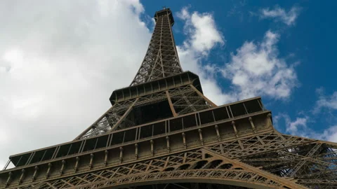 Eiffel tower blue sky with clouds down to top view hyperlapse Video stock 106188848