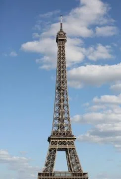 Eiffel Tower called Tour Eiffel in Paris France and the blue sky with many cl 库存照片