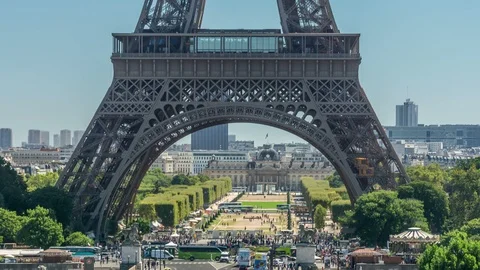 Eiffel tower, Champ de Mars. Car traffic in Paris city center. Zoom out. Stock Footage 86868750