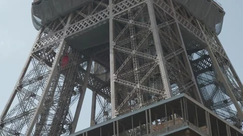 Eiffel tower close up shots of iron construction and elevator Stock Footage 248836904