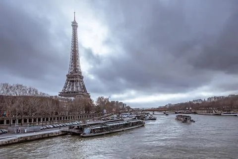Eiffel Tower with Clouds in Paris Stock Photos