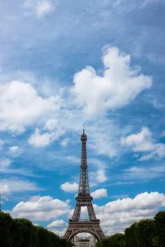 Eiffel tower with clouds. Portrait. Copy space. Stock Photos