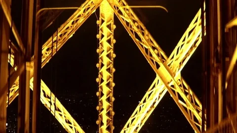 Eiffel Tower, elevator going down, Paris in background Stock Footage 78040482