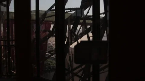 Eiffel Tower - in elevator going down through the tower 库存影片 172384913