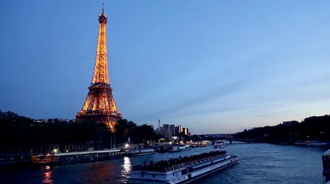 The Eiffel Tower in the evening from the river side in Paris Stock Footage 64070998