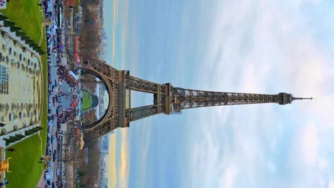 Eiffel tower landmark in Paris at sunset with golden hour light and tourist.. Stock Footage 339758541