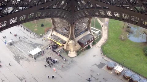Eiffel Tower - looking down pillar to crowds queuing below - 6x timelapse Stock Footage 81003514