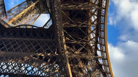 Eiffel Tower metal steel structure view from under tourist attraction in Paris Stock Footage 339750332