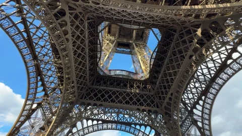 Eiffel Tower metal steel structure view from under tourist attraction in Paris Stock Footage 339750343