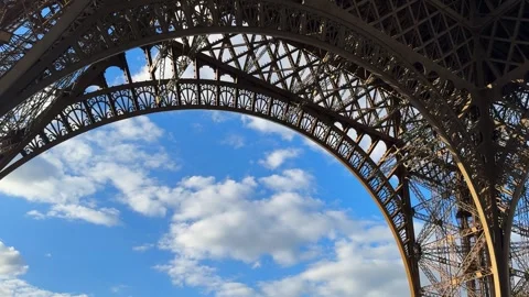 Eiffel Tower metal steel structure view from under tourist attraction in Paris Stock Footage 339750346