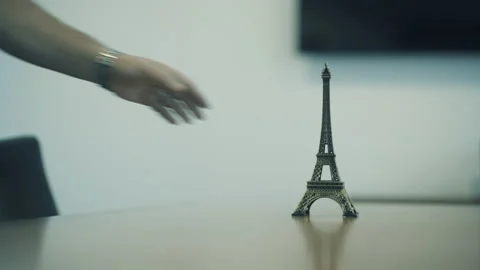Eiffel Tower Model put on table | 4K Stock Footage 219714919