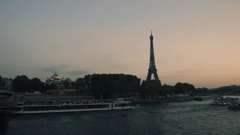 Eiffel Tower at Night next to River Seine | 4K Stock Footage 221019718