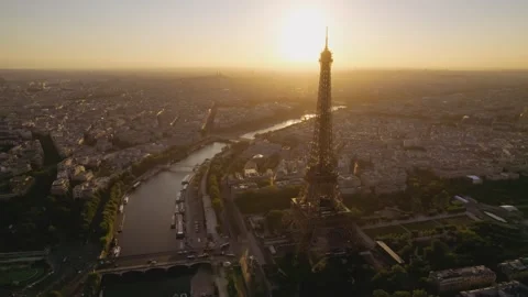 Eiffel Tower Over Paris Rooftops At Sunset Stock Footage 249644789