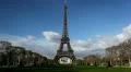 Eiffel Tower in Paris, Champ de Mars, France, Europe, People walking HD Footage