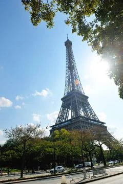 Eiffel tower in paris at day Eiffel Tower in Paris against a dramatic blue... Stock Photos