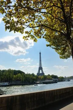 Eiffel tower in paris at day Eiffel Tower in Paris against a dramatic blue... Stock Photos