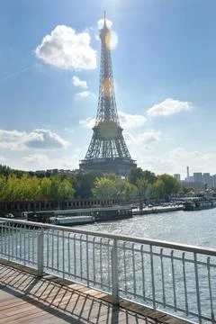 Eiffel tower in paris at day Eiffel Tower in Paris against a dramatic blue... Stock Photos