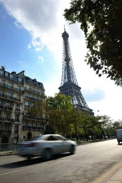 Eiffel tower in paris at day Eiffel Tower in Paris against a dramatic blue... Stock Photos