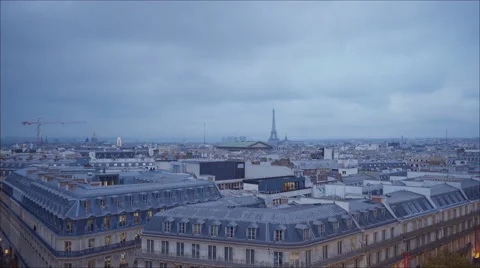 The Eiffel Tower in Paris in the evening view from a rooftop Stock Footage 46476962