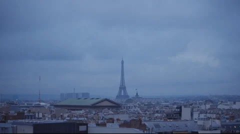 The Eiffel Tower in Paris in the evening view from a rooftop Stock Footage 46477289