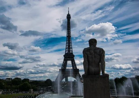 Eiffel Tower Paris with man statue on the Trocadero Gardens Stock Photos