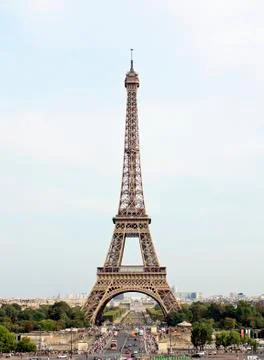 Eiffel tower in Paris over smooth cloudy sky Stock Photos