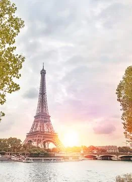 Eiffel tower in Paris at sunset. Stock Photos
