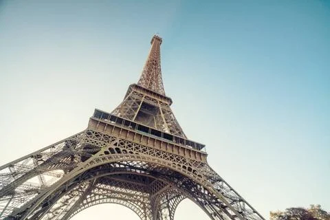 Eiffel Tower reaching into the clear sky at sunset, Paris, France Paris Fr... Stock Photos