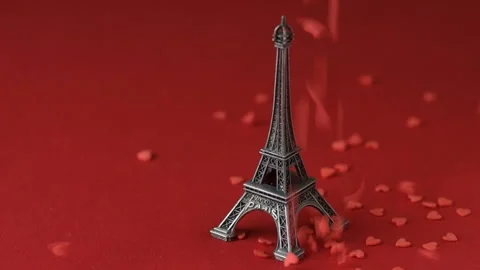 Eiffel tower red background heart confetti slow-mo Stock Footage 146750229