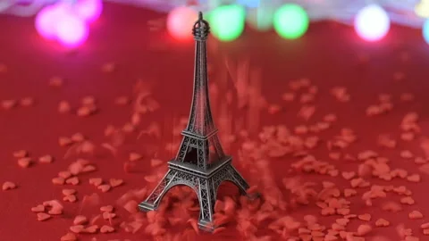 Eiffel tower red heart confetti colourful lights Stock Footage 146750992