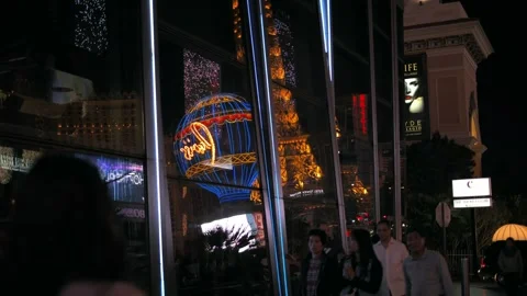 Eiffel Tower Replica and Paris Las Vegas Neon Sign Reflection at Night Video stock 334458167