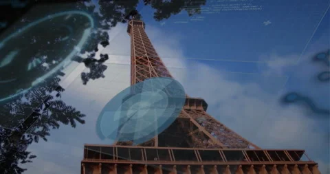 Eiffel Tower rising into blue sky, displaying floating circular HUDs and grid Video stock 308068383