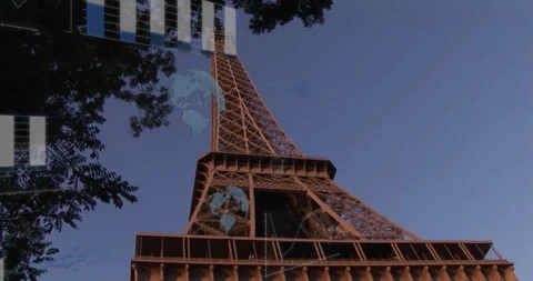 Eiffel Tower rising into frame, displaying bar charts and globe overlays in flat Stock Footage 308046910
