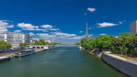 Eiffel tower at the river Seine timelapse hyperlapse from bridge in Paris Stock Footage 80458219
