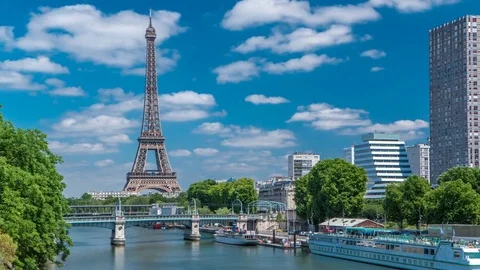 Eiffel tower at the river Seine timelapse from bridge in Paris, France Stock Footage 80458358