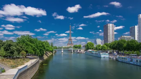 Eiffel tower at the river Seine timelapse hyperlapse from bridge in Paris Stock Footage 141984238