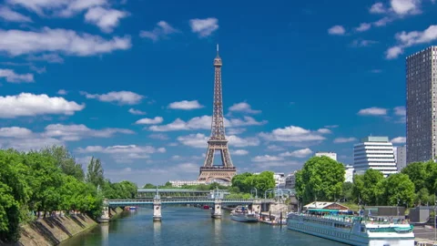 Eiffel tower at the river Seine timelapse hyperlapse from bridge in Paris Stock Footage 236492354