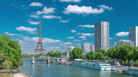 Eiffel tower at the river Seine timelapse from bridge in Paris, France Stock Footage 236492907
