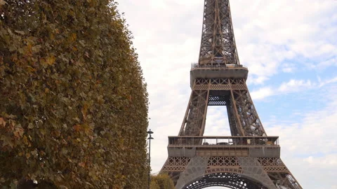 Eiffel Tower seen from the Champ de Mars park in the Fall in Paris, France Stock Footage 223501330