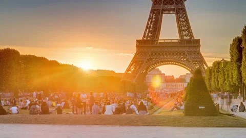 Eiffel Tower seen from Champ de Mars at sunset timelapse, Paris, France Stock Footage 236498593