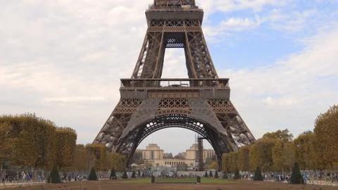 Eiffel tower seen from the Champs de Mars in autumn in Paris Video stock 223501316