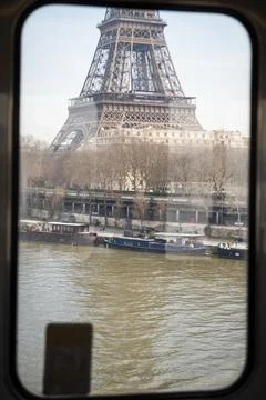 The Eiffel Tower seen from an elevated train of the Paris Metro in Paris Stock Photos