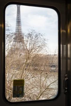 The Eiffel Tower seen from an elevated train of the Paris Metro in Paris 写真素材