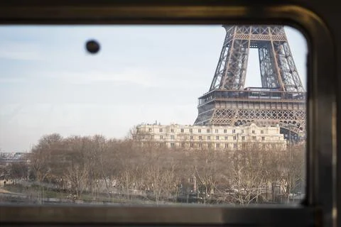The Eiffel Tower seen from an elevated train of the Paris Metro in Paris 写真素材
