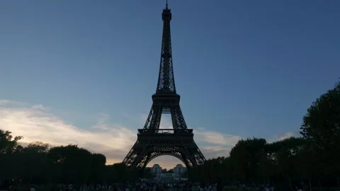 Eiffel Tower silhouette against Paris sunset sky Stock Footage 344833318